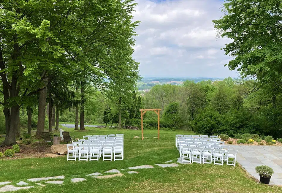 Seating arranged for an outdoor ceremony space