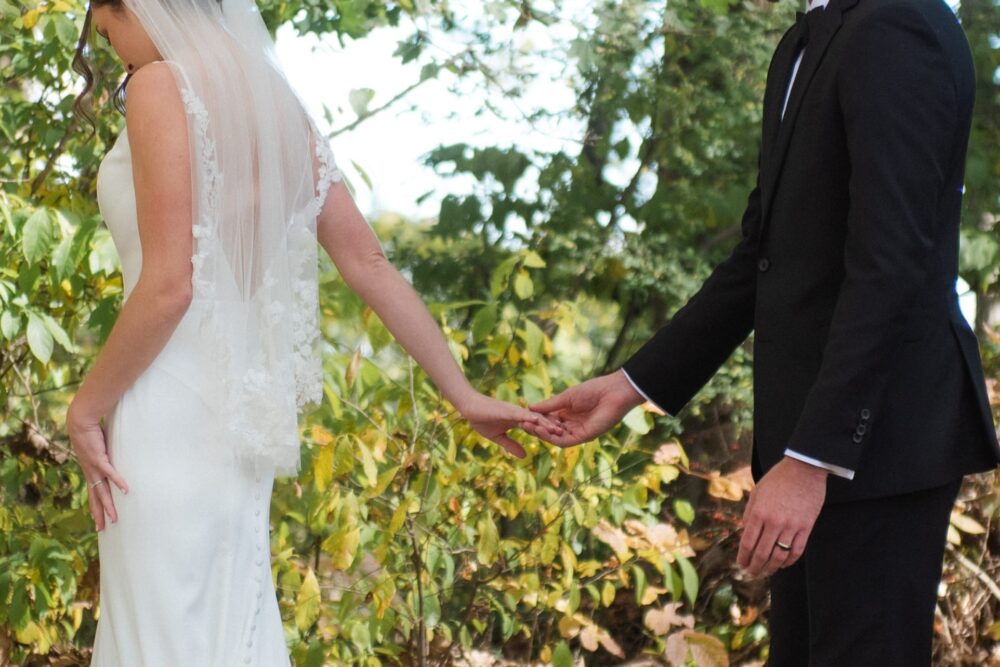 Bride and Groom holding hands at our unique wedding venue in PA.