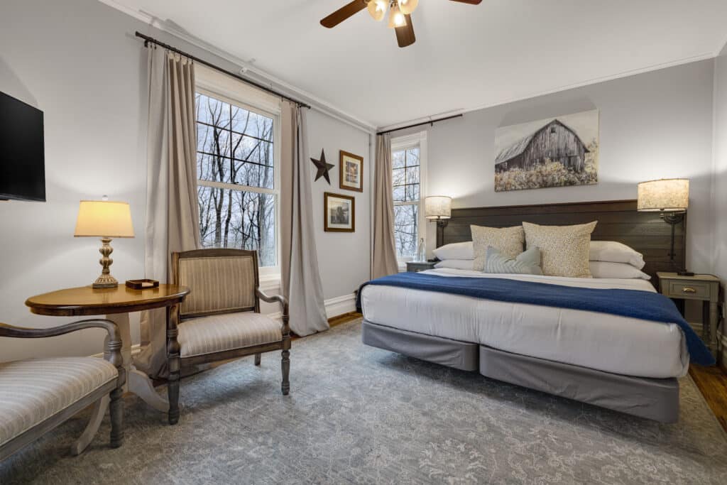 The Carriage Room with king bed and sitting area at our Pennsylvania Bed and Breakfast.